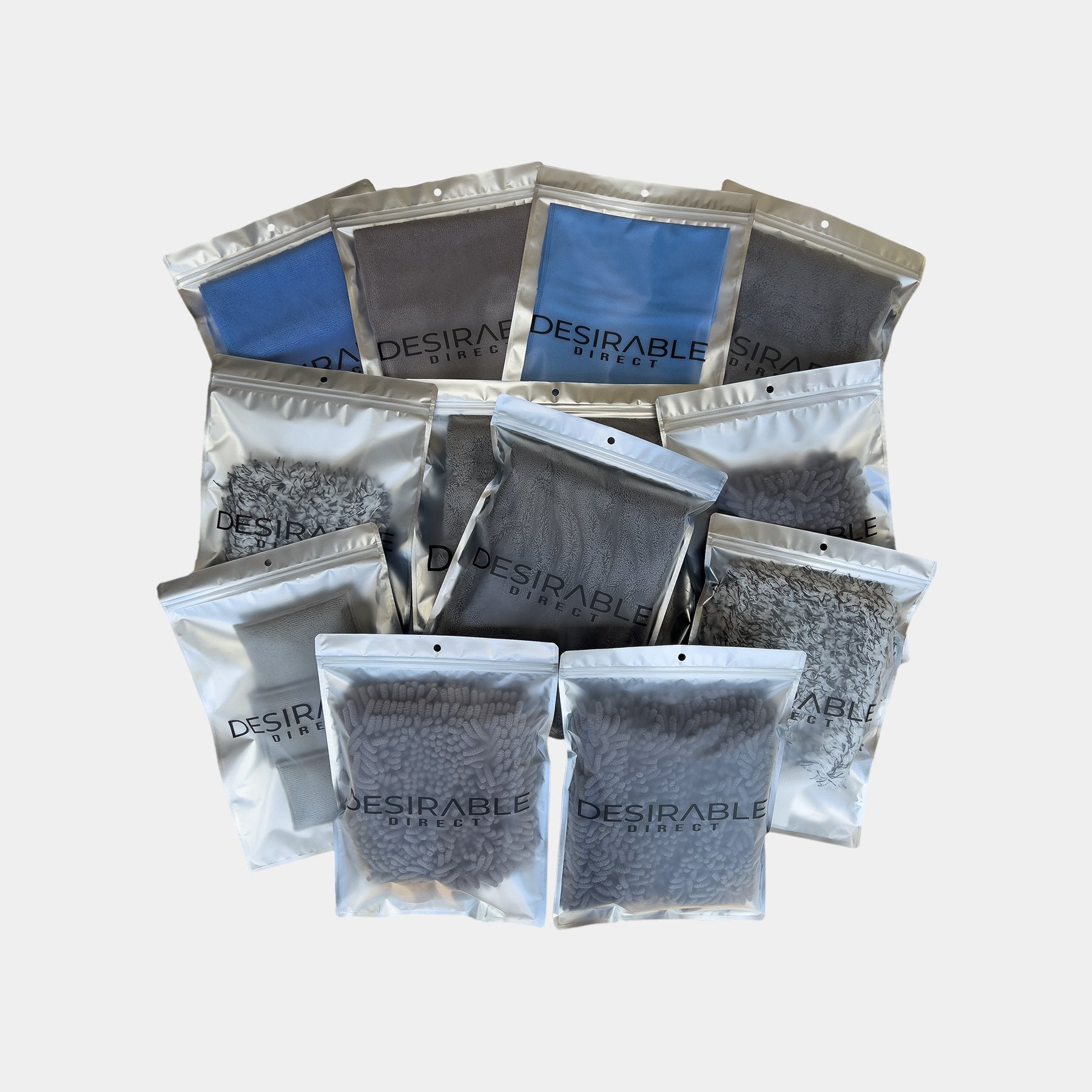 Car care valeting and detailing accessories 35 piece bundle displayed on a white background in silver packaging with desirable direct printed on the front to keep the item clean when not in use.