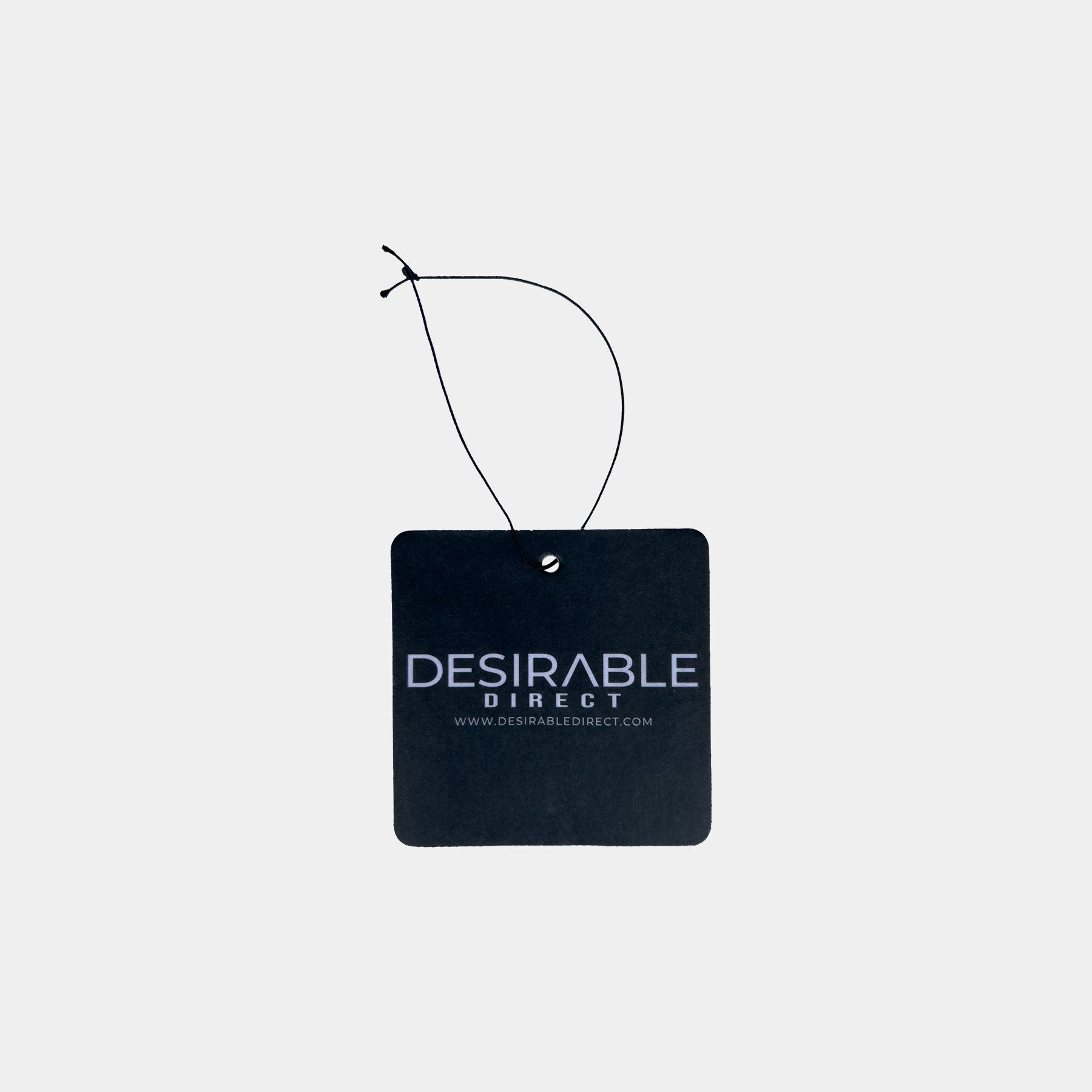Car care black car air freshener with desirable direct and desirabledirect.com printed on the front, displayed on a white background.