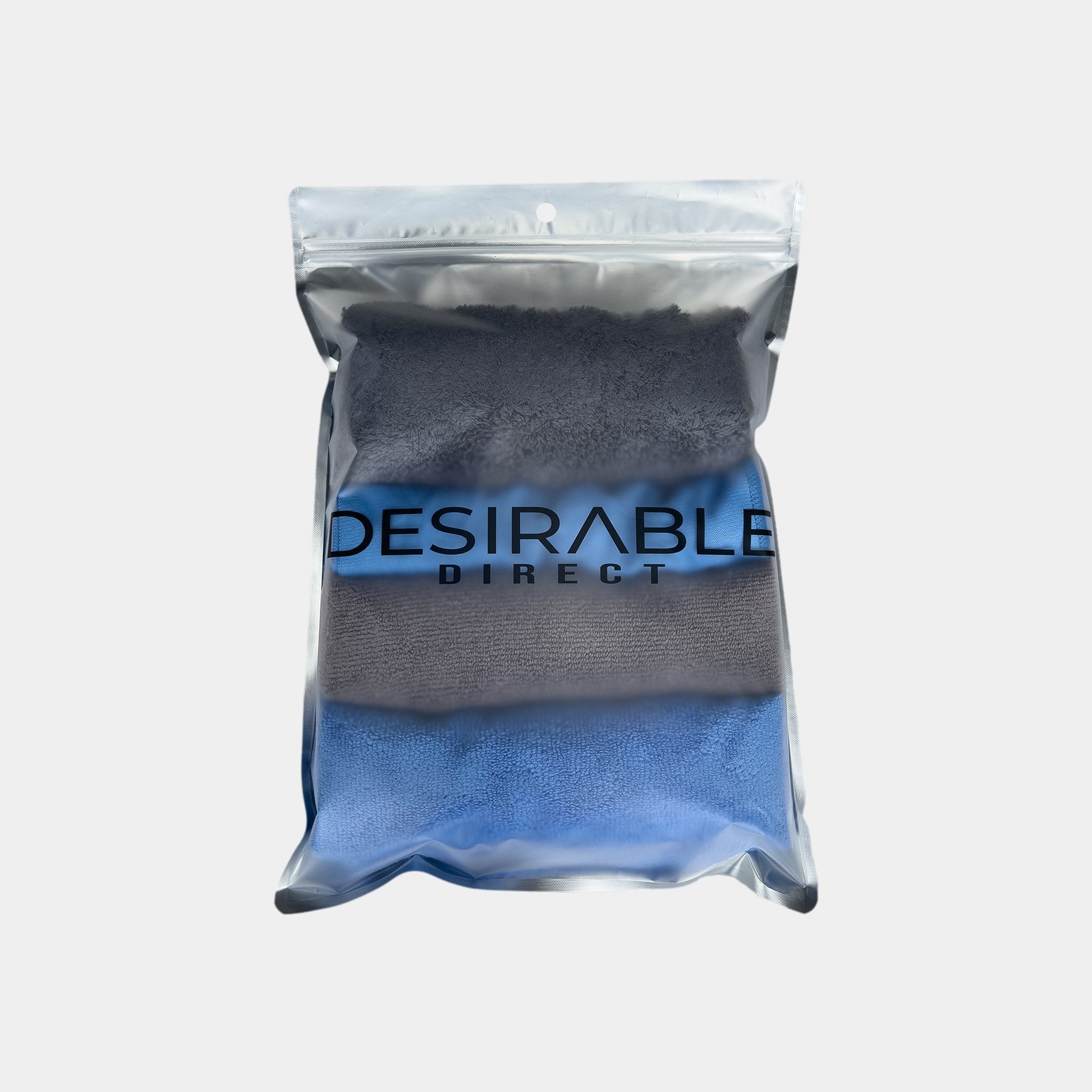 Car care microfibre cloth bundle displayed on a white background in silver packaging with desirable direct printed on the front to keep the item clean when not in use.