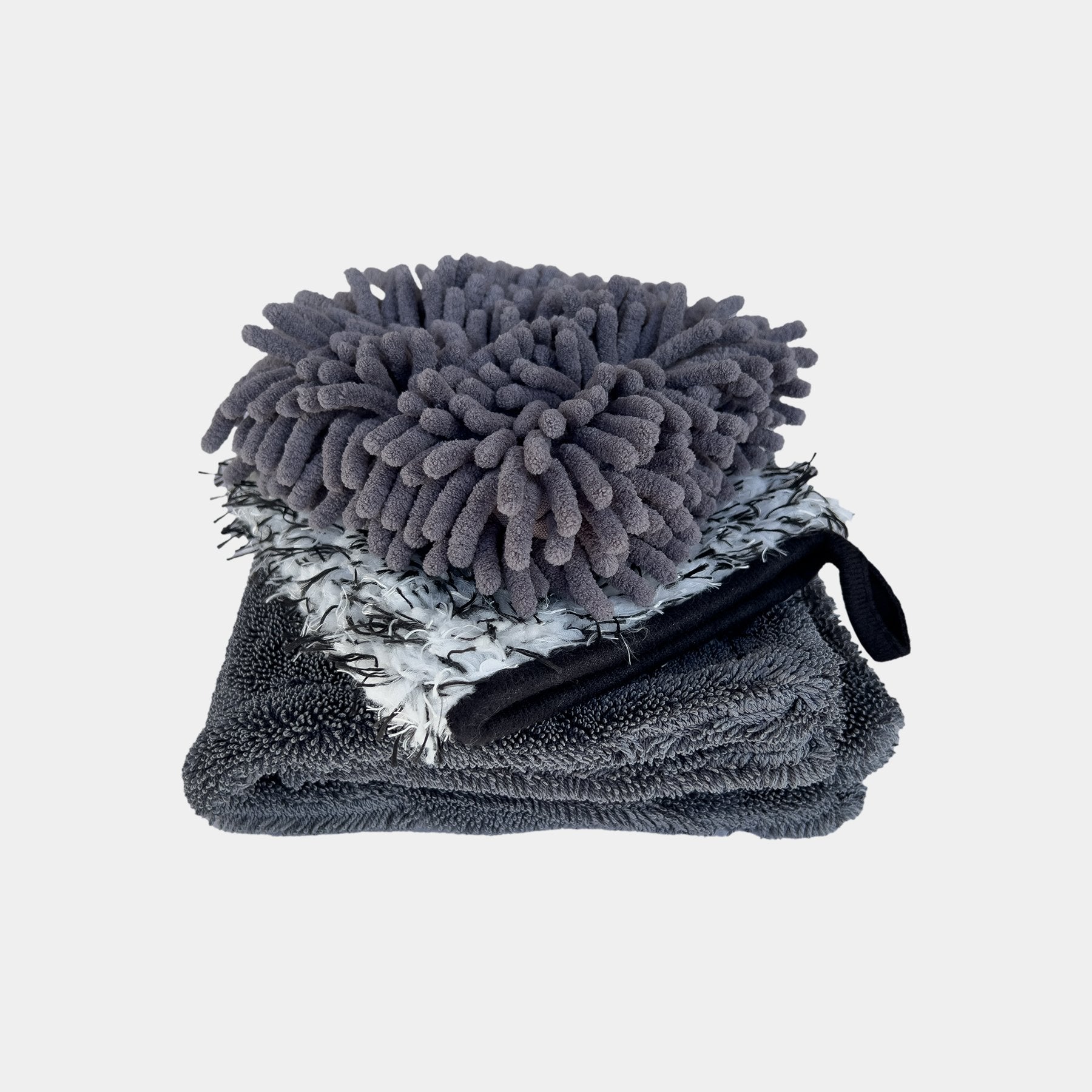 Car care microfibre wheel cleaning wash and dry bundle displayed on a white background. A small drying towel at the bottom, and a wheel mitt and pad on top.