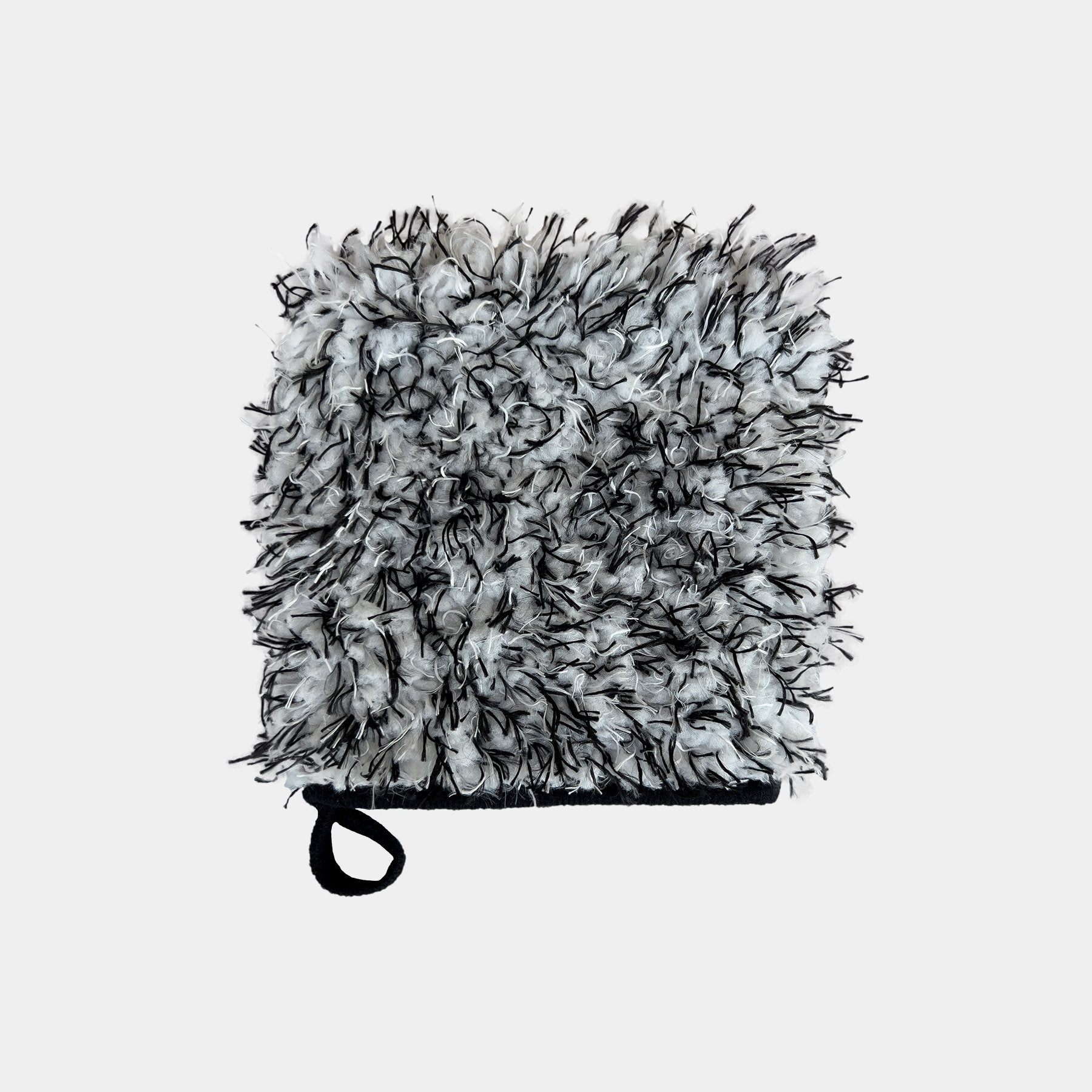 Car care microfibre black and white wheel and trim wash mitt displayed on a white background.