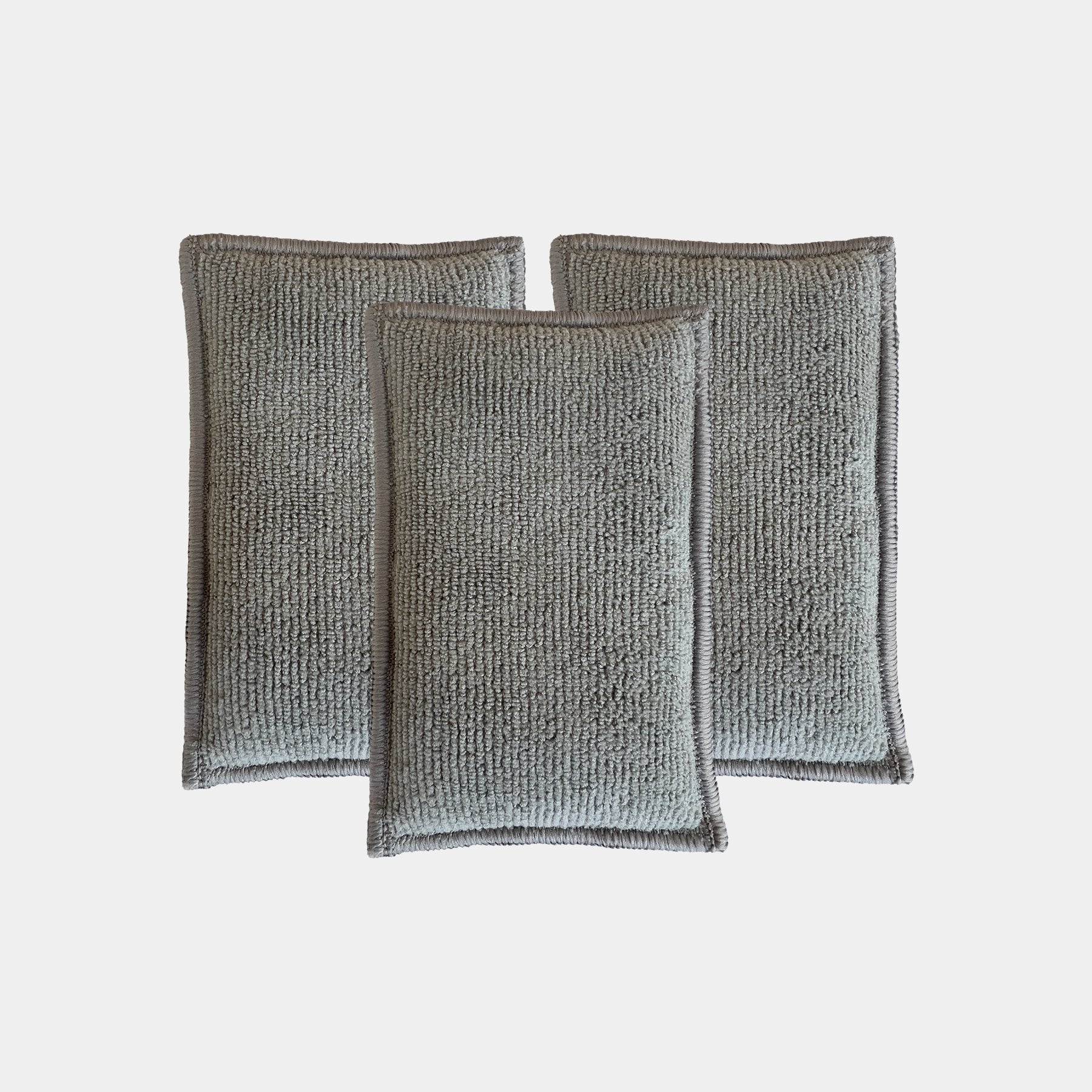Car care three microfibre grey interior scrub pads are displayed on a white background.